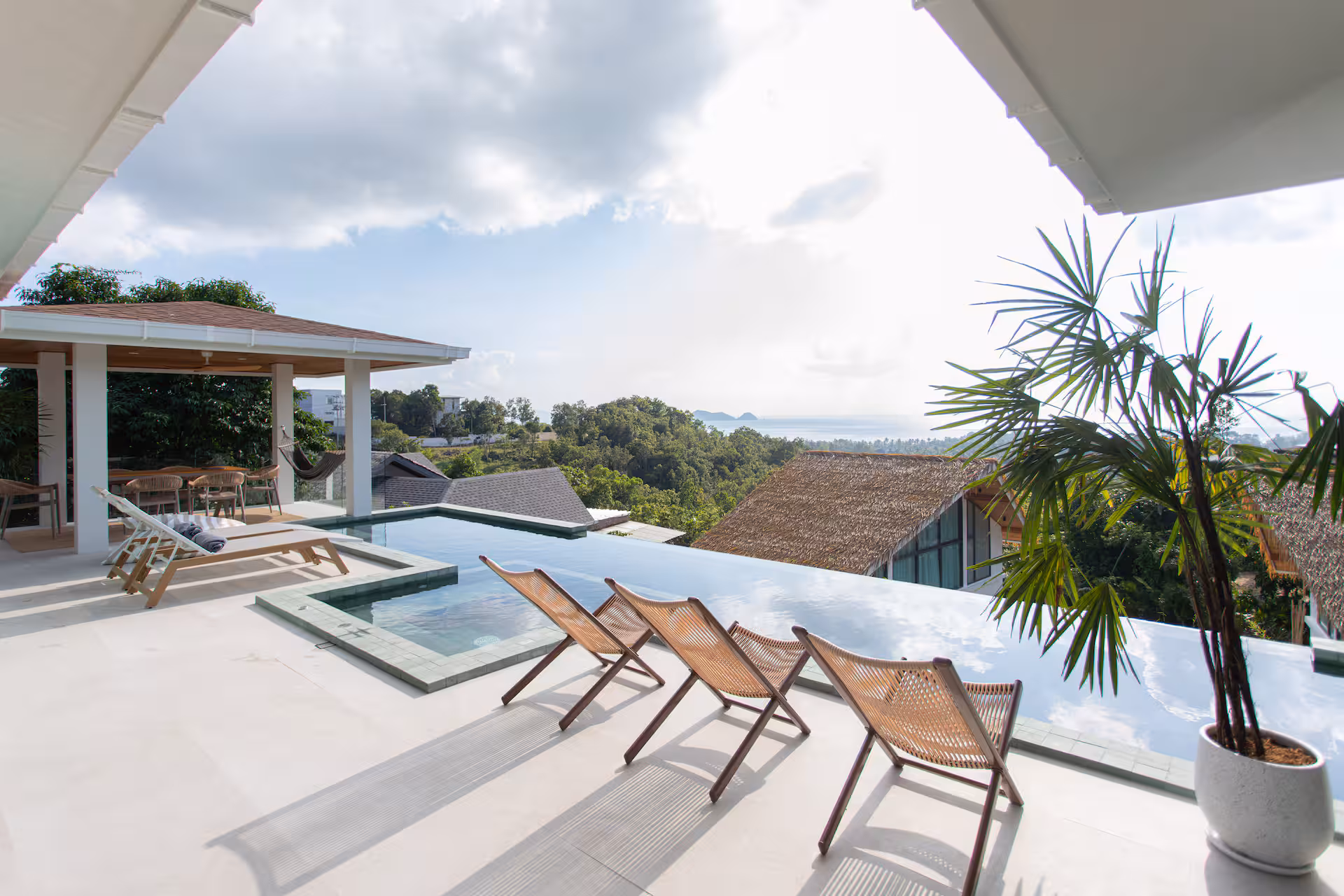 Villa Three — open living area with jungle canopy view